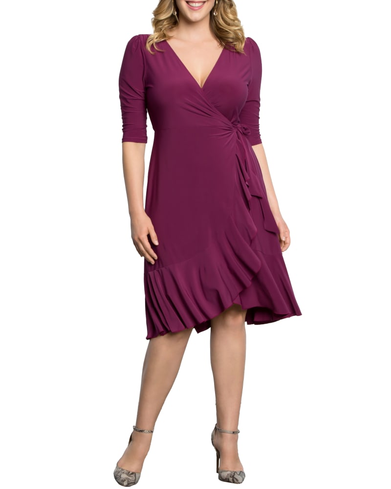 Front of a model wearing a size 0X Whimsy Ruffled Wrap Dress in MAGENTA by Kiyonna. | dia_product_style_image_id:279215